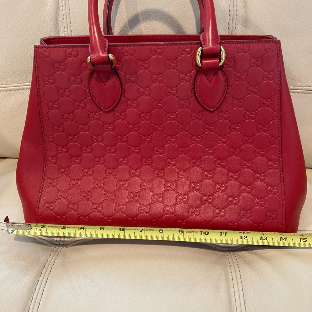 Large Red Gucci leather hand bag. Practically new!